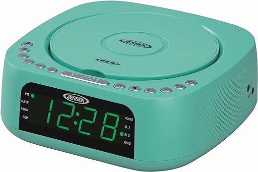 Jensen Teal Modern Home Audio CD Player Tabletop Stereo Dual Alarm Clock Digital FM Radio | Top-Loading CD/MP3/WMA Player | USB Charging Port 2.1A | Headphone Jack | 0.9 Display Green LED