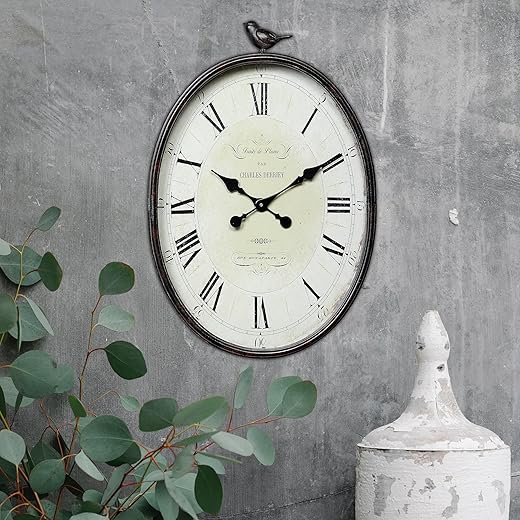 Creative Co-Op Oval Metal Wall Clock with Bird