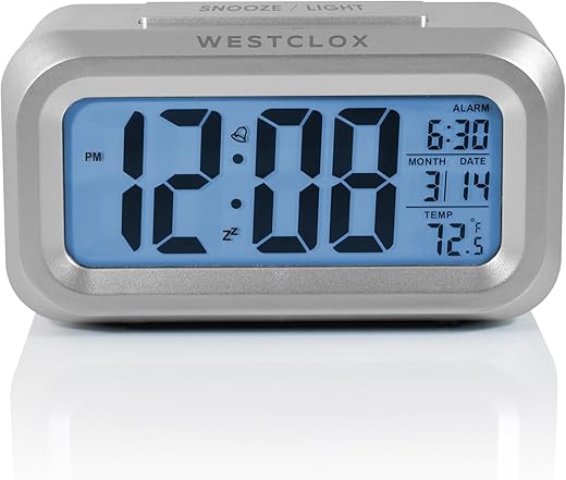 Westclox Travel Alarm Clock with Large Digital Display and Blue Backlight on Demand, Alarm Clock, Month/Date and Temperature Display with Ascending 5 Minute Snooze Alarm, Silver