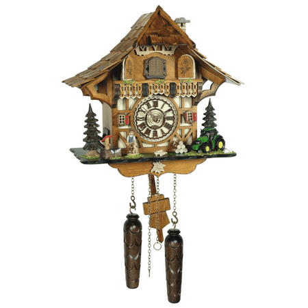 WILHELM, Chalet style cuckoo clock with a boy and a tractor. Melodies and cuckoo call