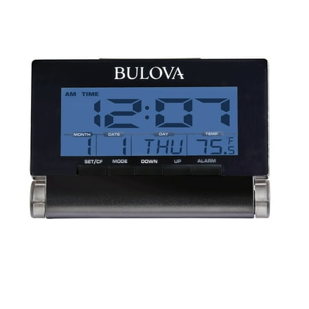 Bulova Model B1707 Travel Time LCD quartz alarm clock that measures room tempurature in Fahrenheit or Celsius.