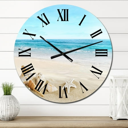 DESIGN ART Designart 'Landscape With Shells On Tropical Beach' Nautical & Coastal wall clock 23 In. Wide x 23 In. High