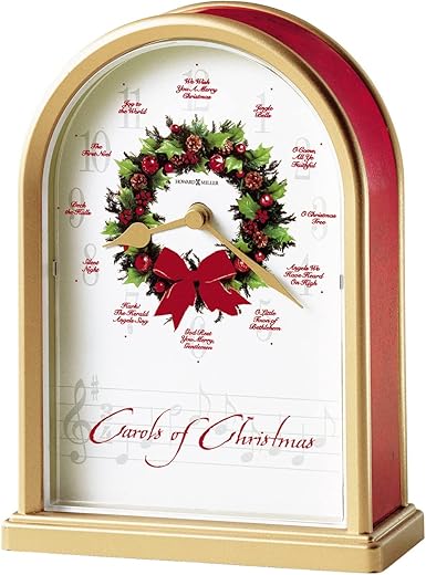 Howard Miller Carols of Christmas II Table Clock 645-424 – Satin Brass Finish, Red Marble Tone Sides, Decorative Wreath Center, 12 Musical Carols, Quartz Movement