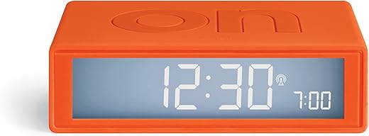 Lexon Flip+ Digital Alarm Clock for bedrooms, Reversible On/Off Faces with Snooze Function, LCD Display & Touch Sensor Light, Battery Operated, Rubber - Orange